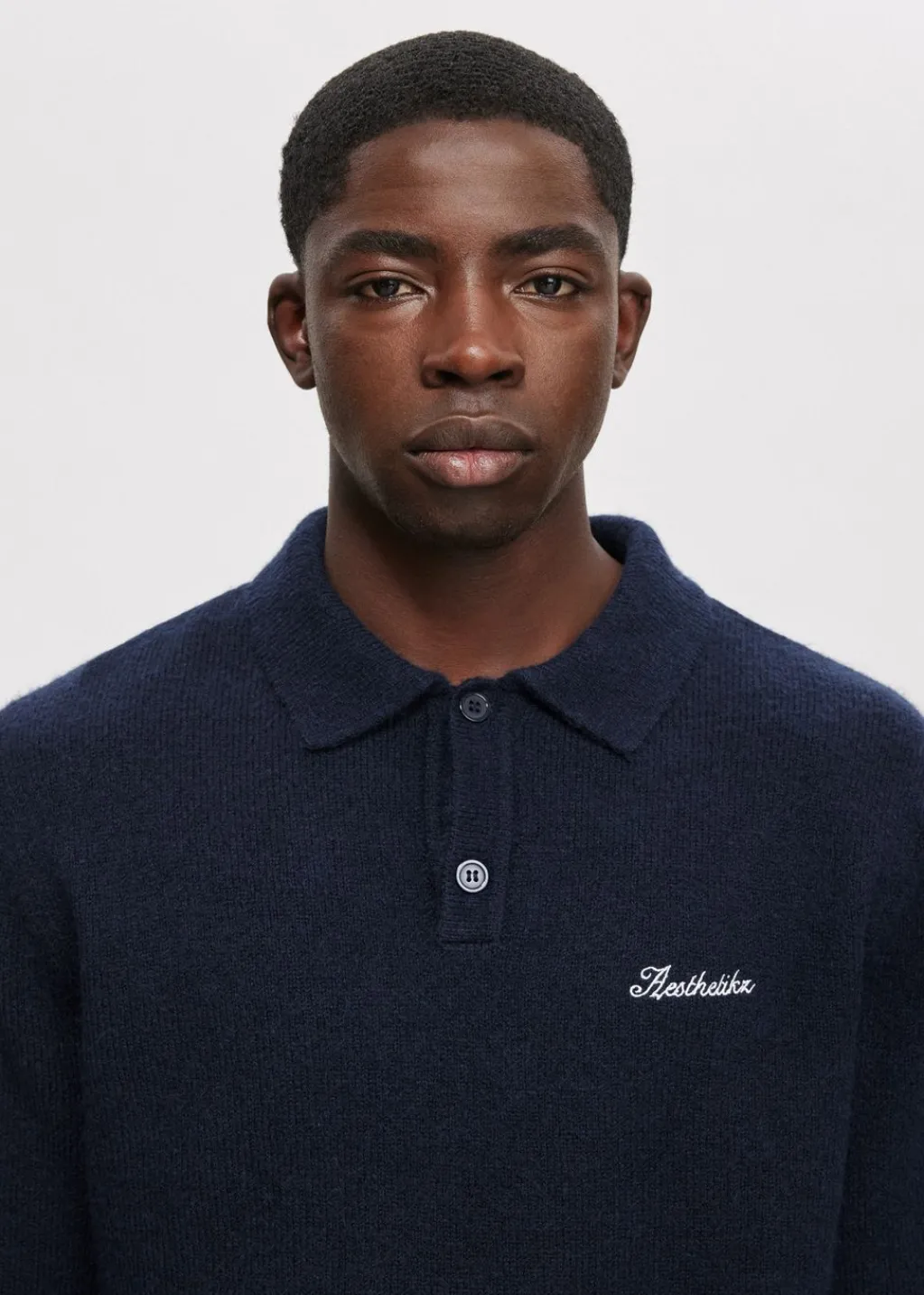Polo's|Truien En Vesten<The Sting Gebreide polo met merk donkerblauw