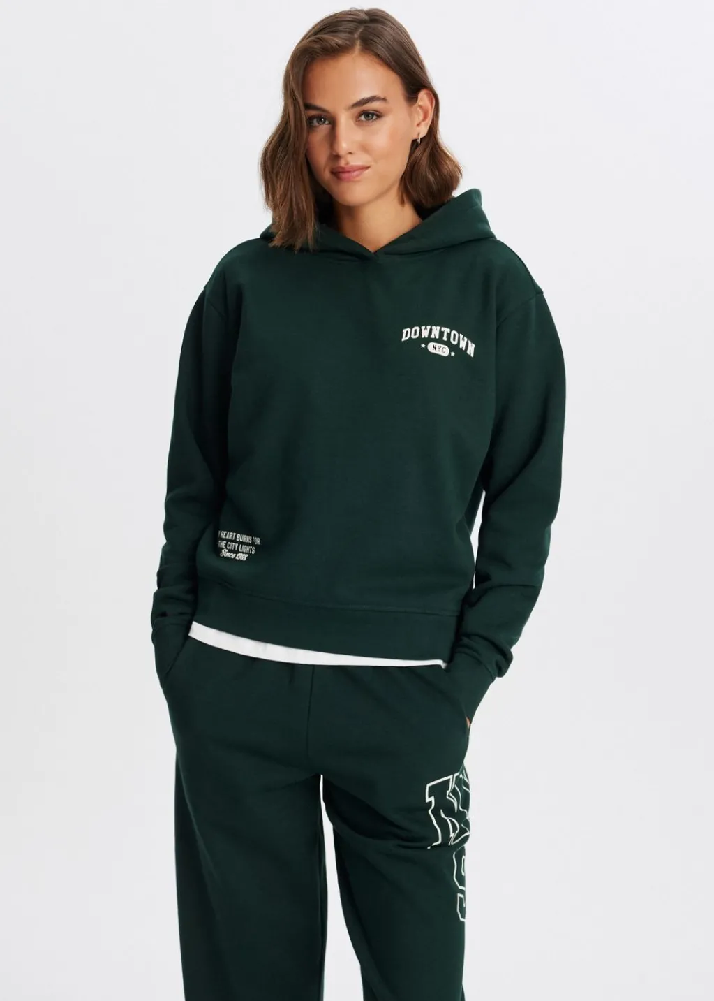 Sweaters En Hoodies<The Sting Hoodie met varsity print donkergroen