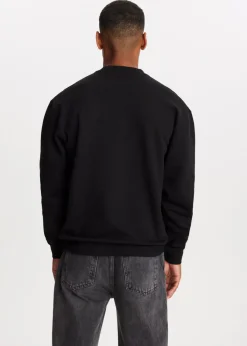 Sweaters En Hoodies<The Sting Oversized sweater met logo zwart