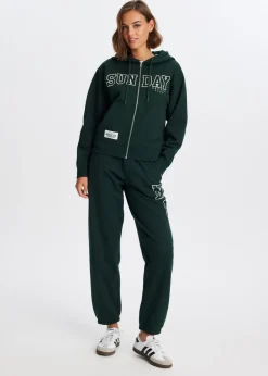 Broeken<The Sting Sweatpants met zijprint donkergroen