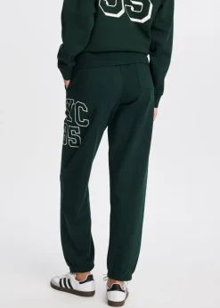 Broeken<The Sting Sweatpants met zijprint donkergroen