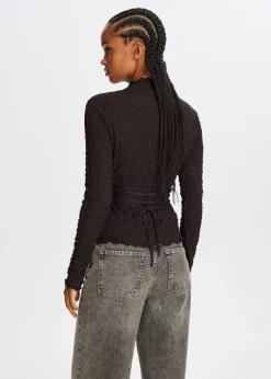 Tops<The Sting Top met strikdetail donkerbruin
